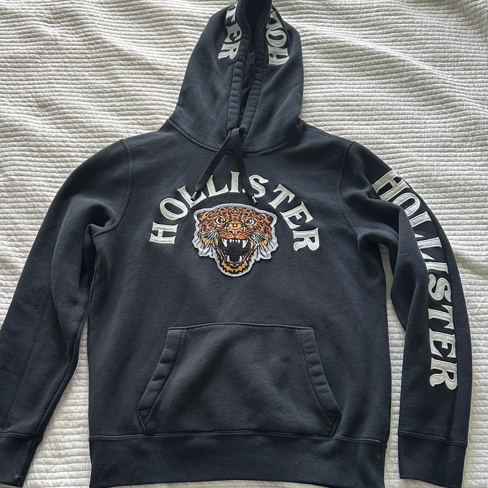 Vintage Hollister Black Hoodie with Fierce Tiger Design